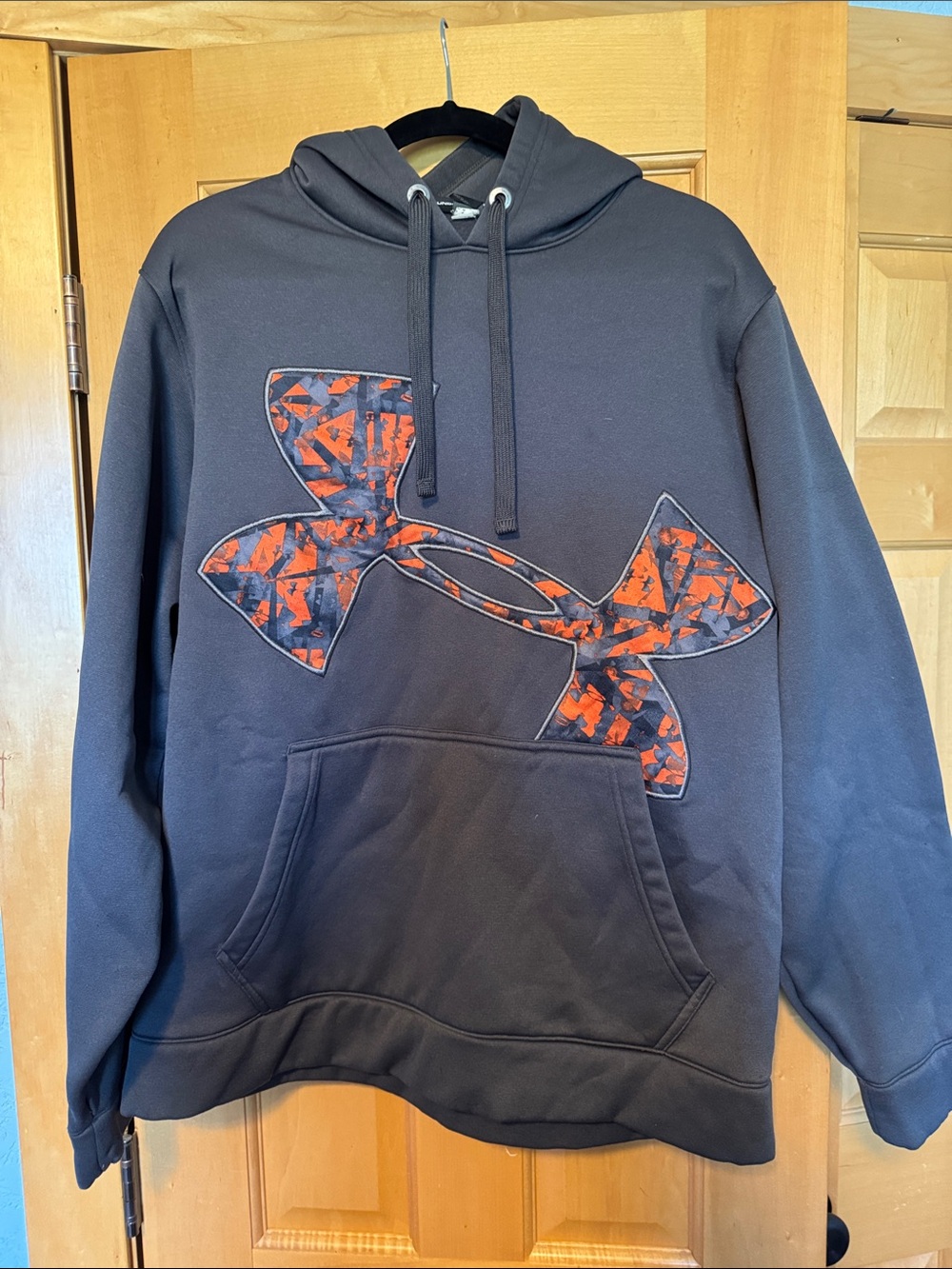Under Armour gray Hoodie with orange Patterned Logo